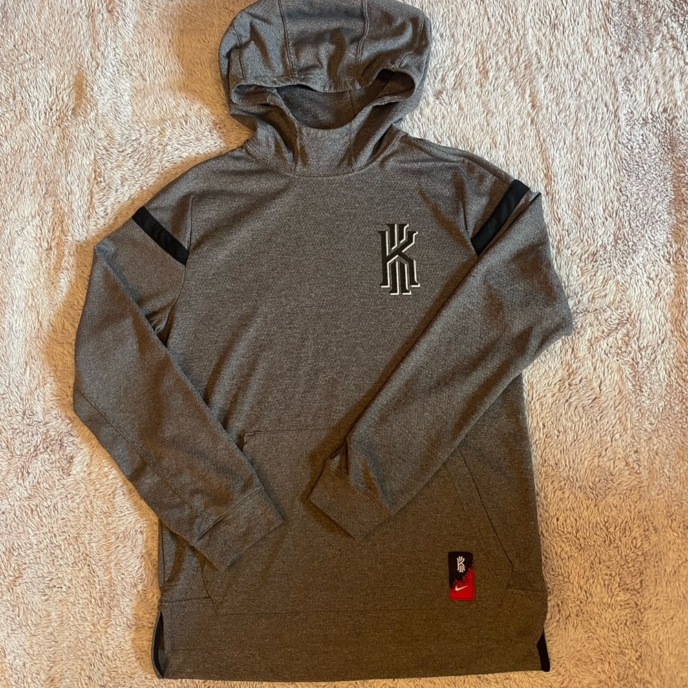 Nike Kyrie Irving light weight hooded shirt.